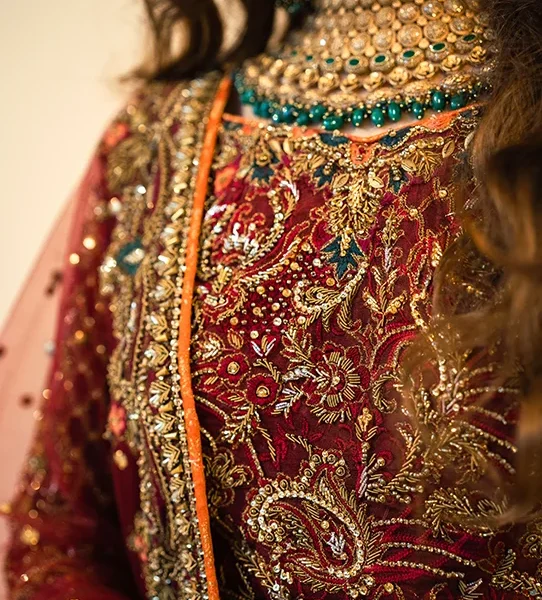 Embroidered Maroon Lehenga Choli with a Net Dupatta